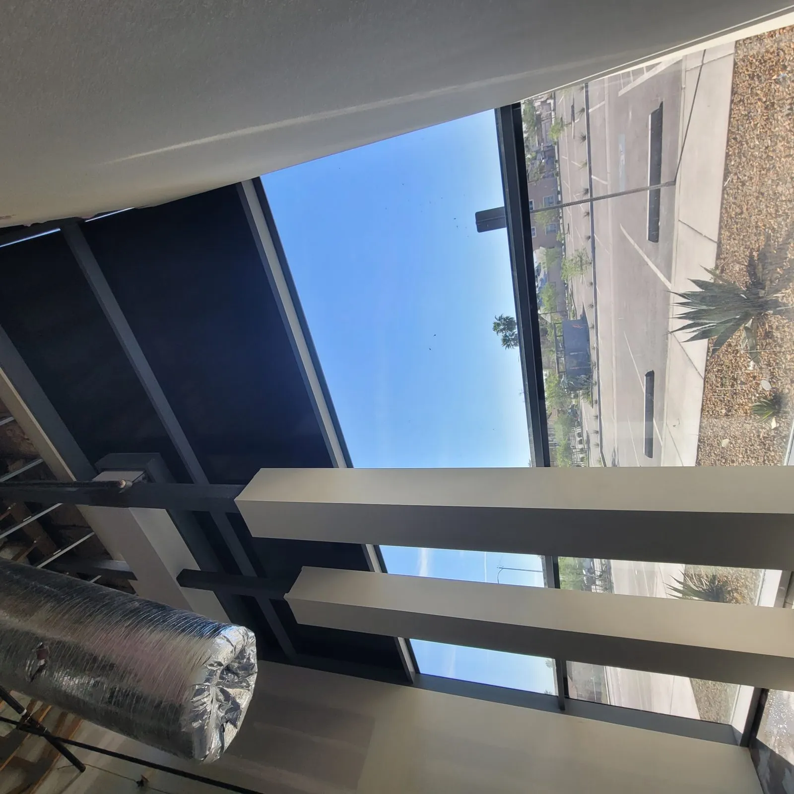 Commercial solar film installed on large glass panels Las Vegas