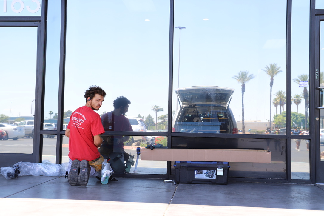 Seymour Clearly crew installing commercial window film