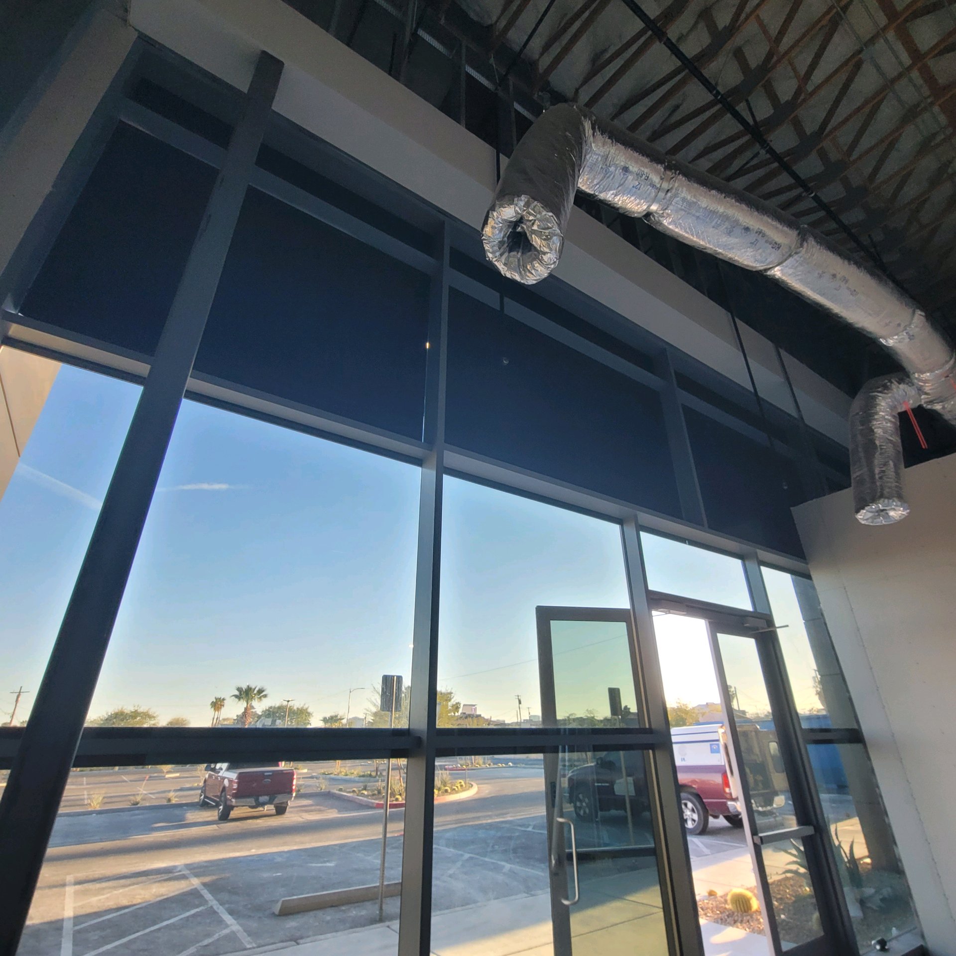 Commercial building interior after solar film entry doors