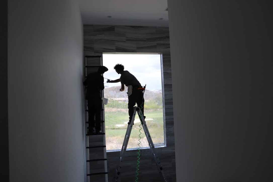 Two man crew window film installation