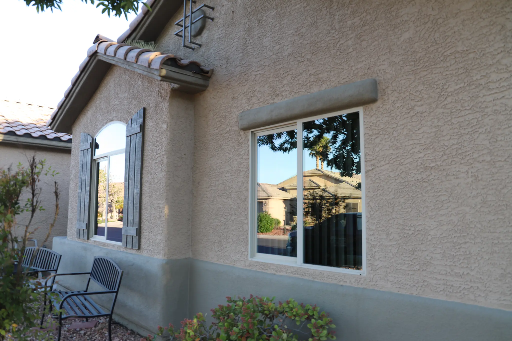 Upscale home arched window after solar tinting Summerlin NV