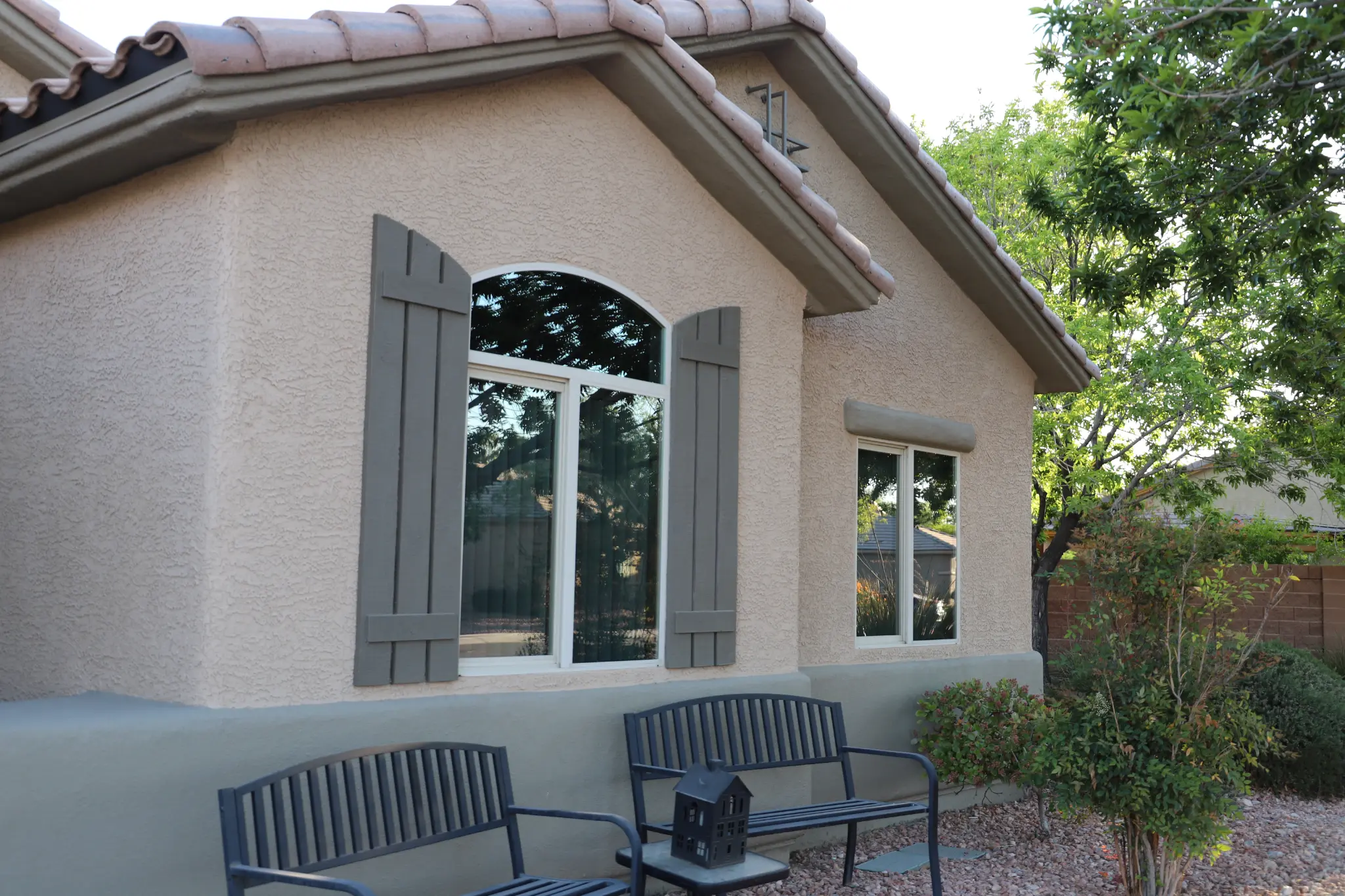 Upscale home corner windows after solar film