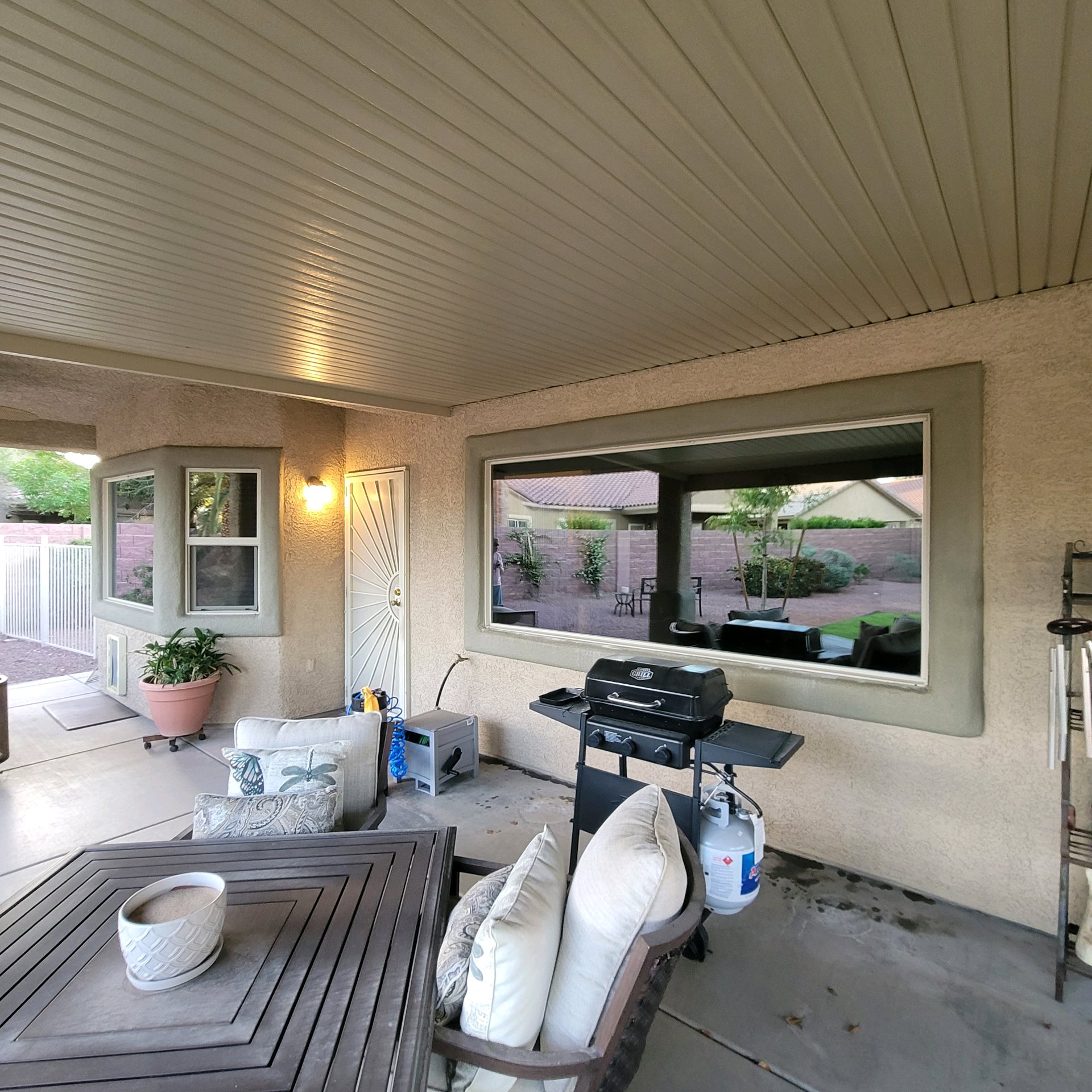 Covered patio home after solar window film