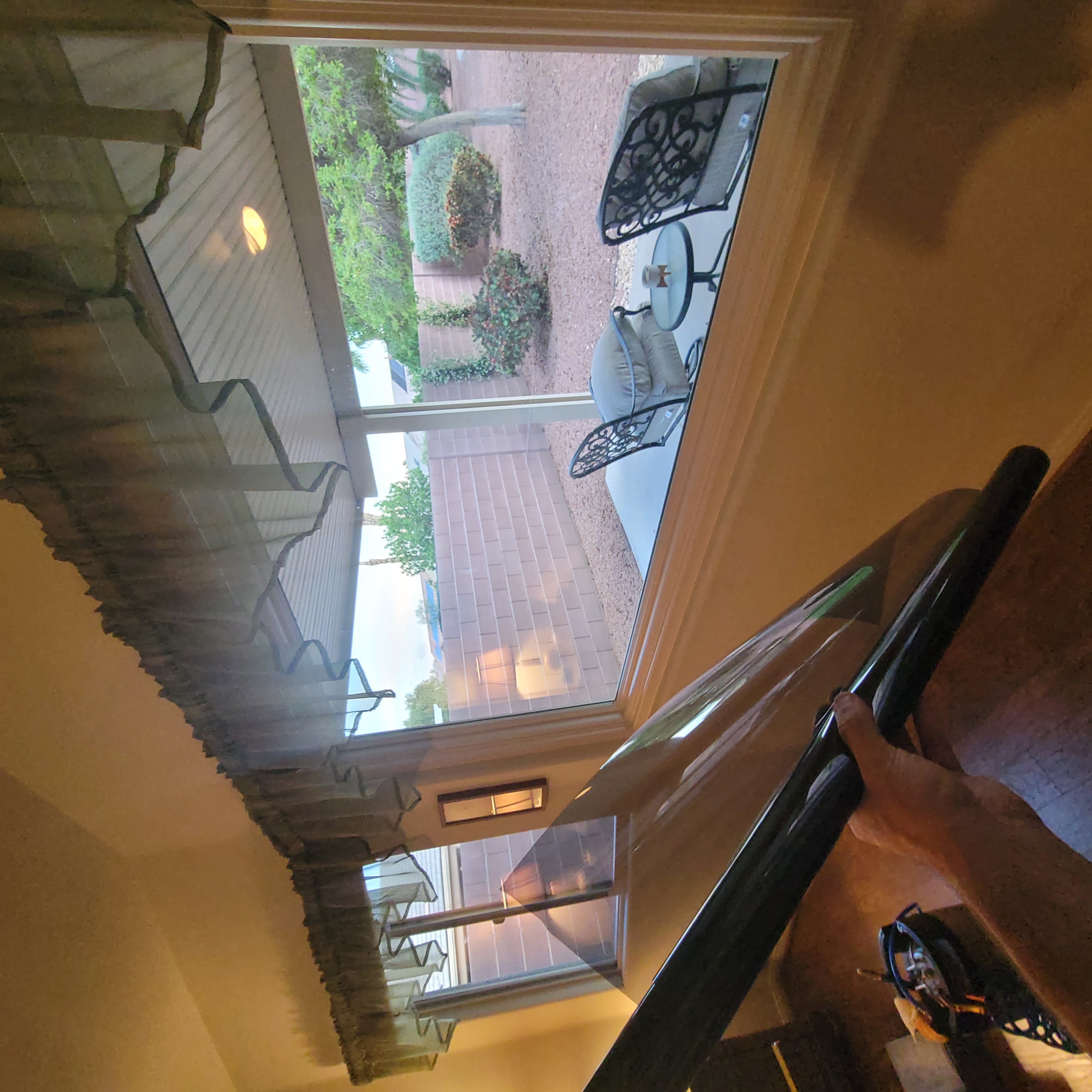 Interior window film installation holding film roll