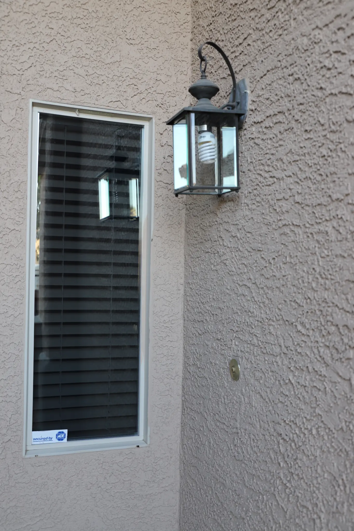 Narrow window after solar tinting with lantern