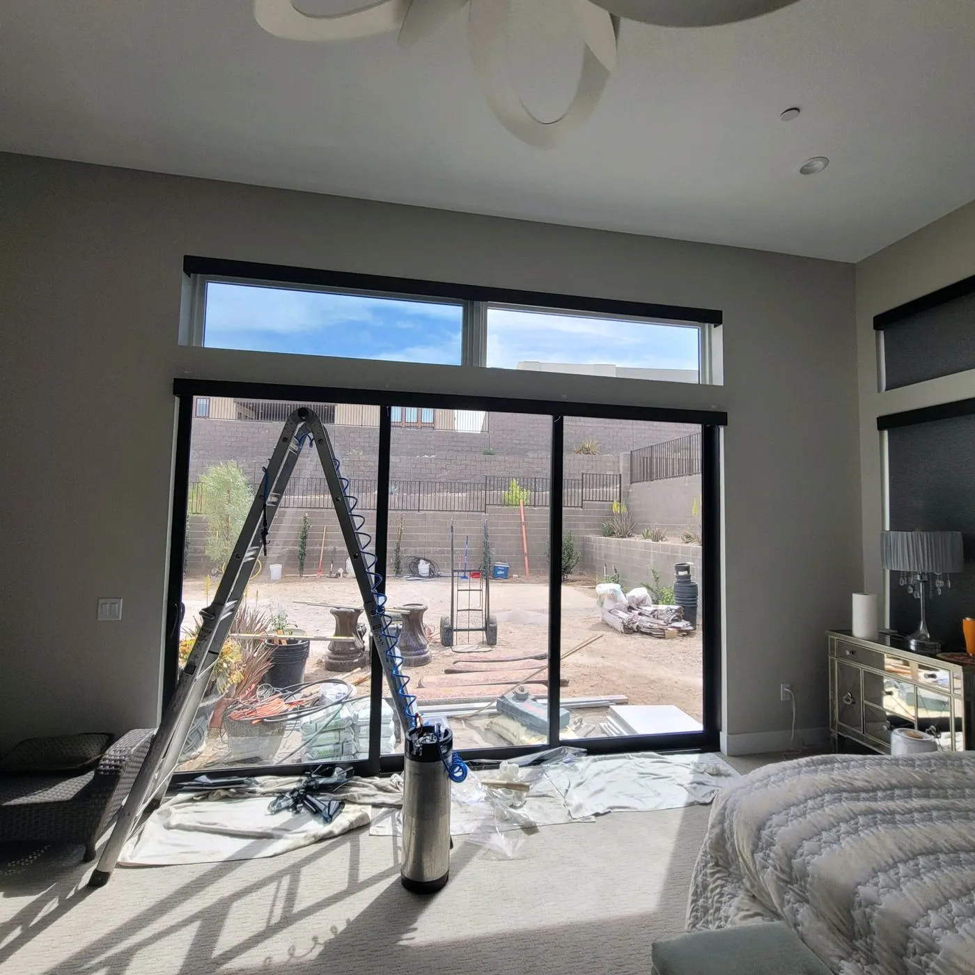 Solar film installation in progress luxury home