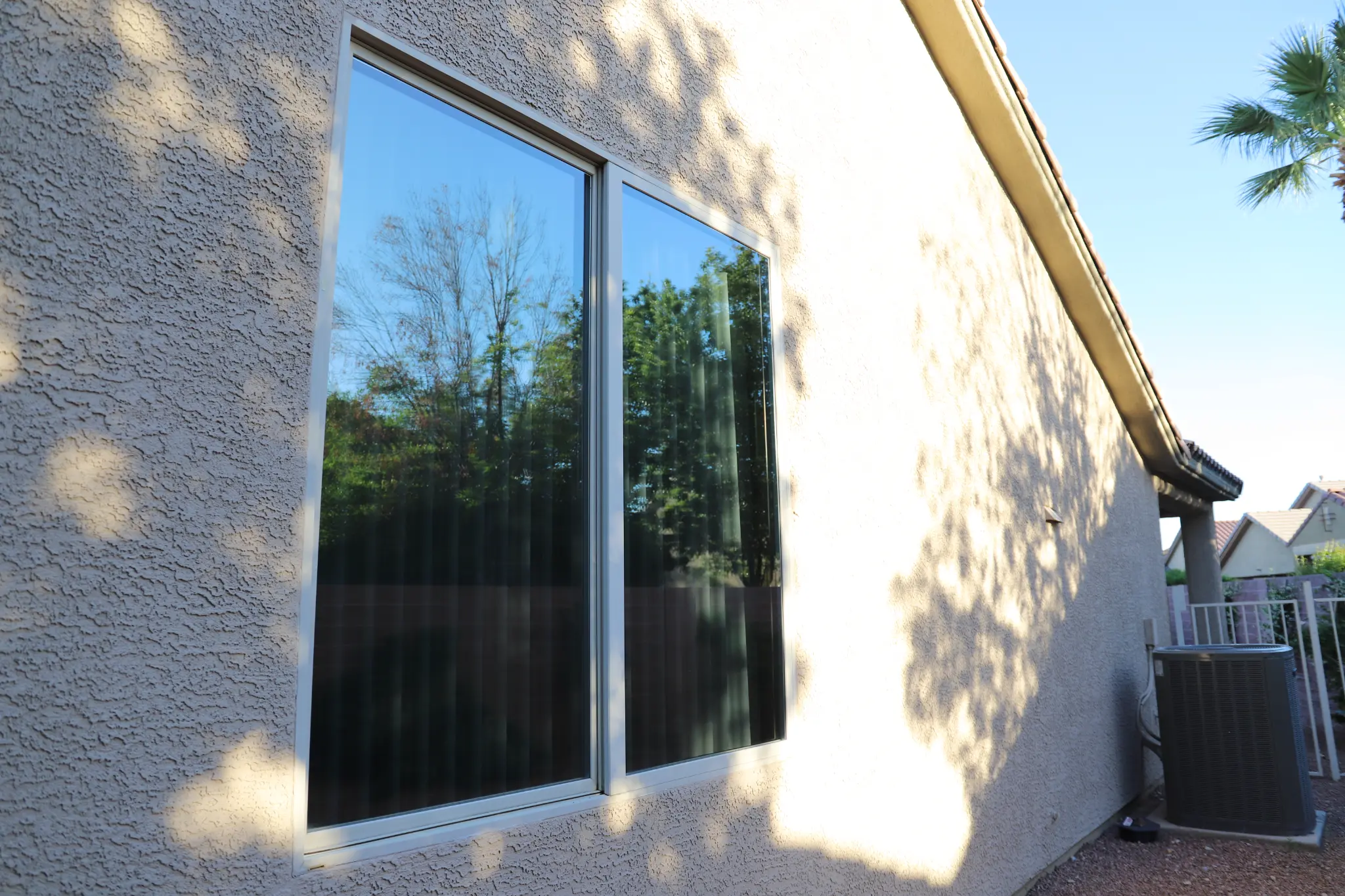 Residential home side windows after solar film