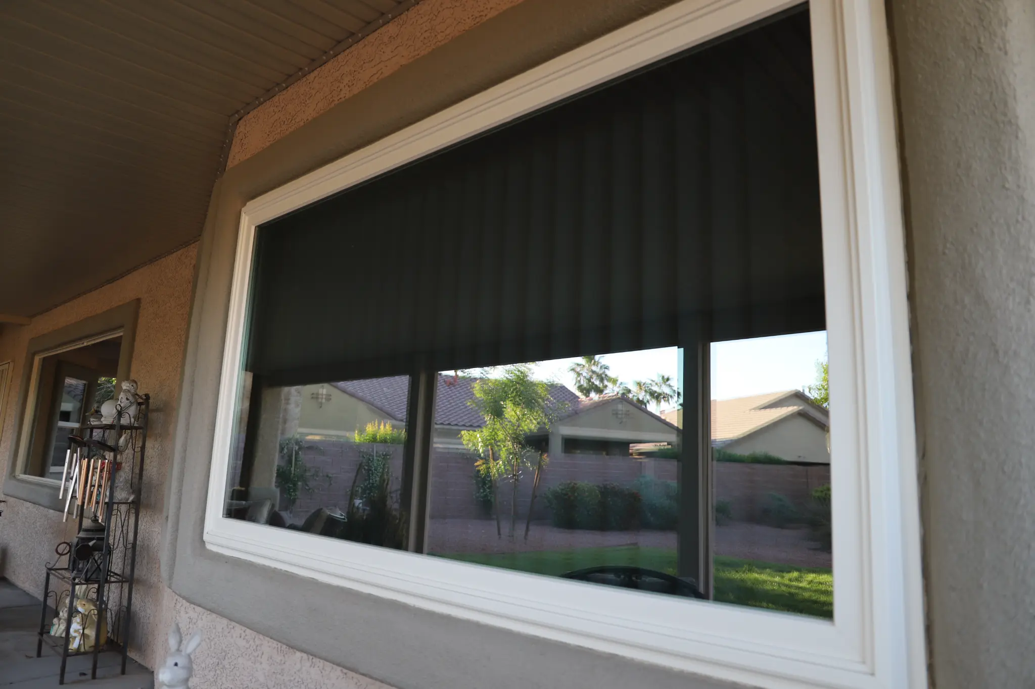 Residential patio window after solar tinting