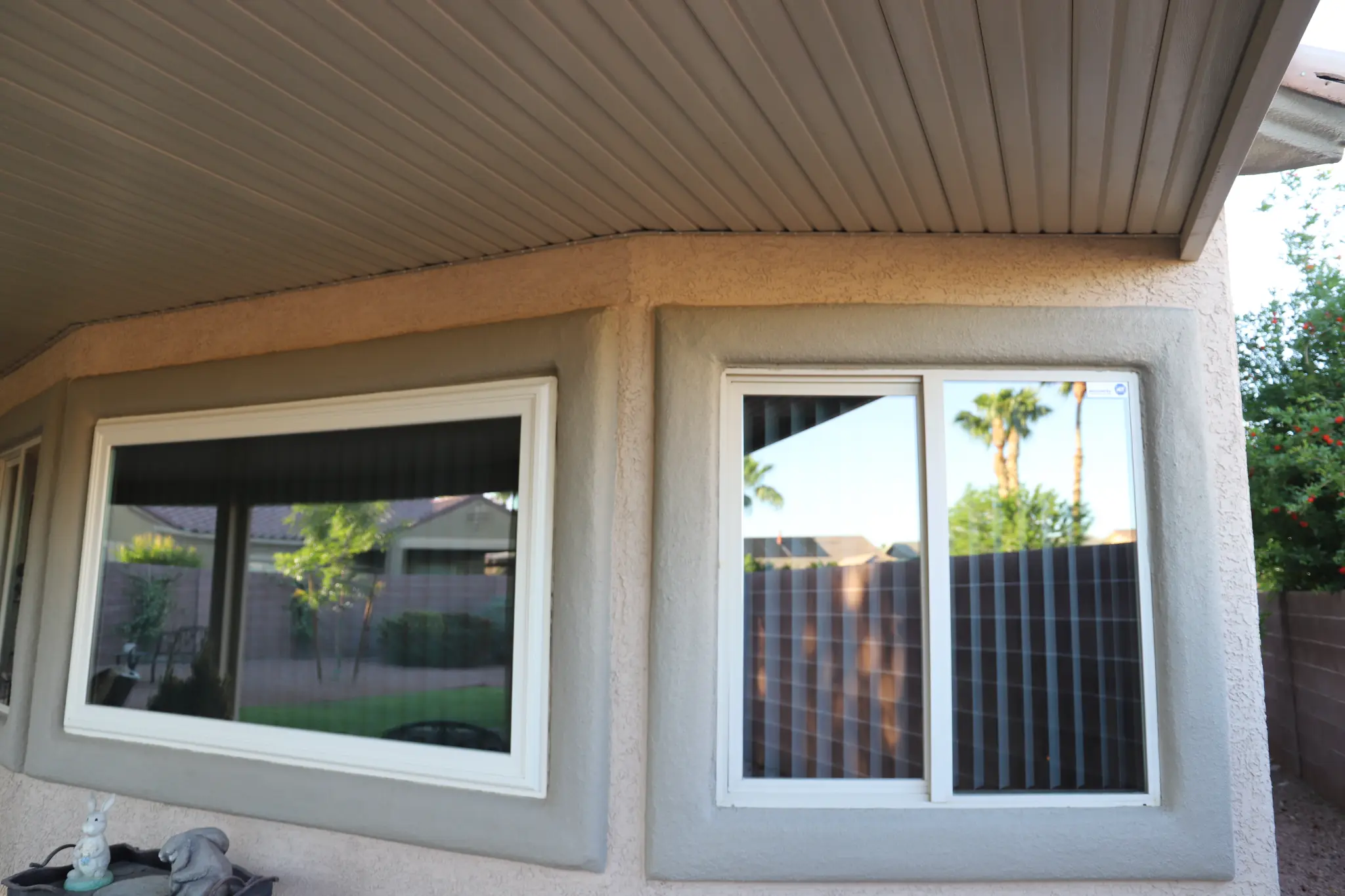 Window film installation in progress residential home