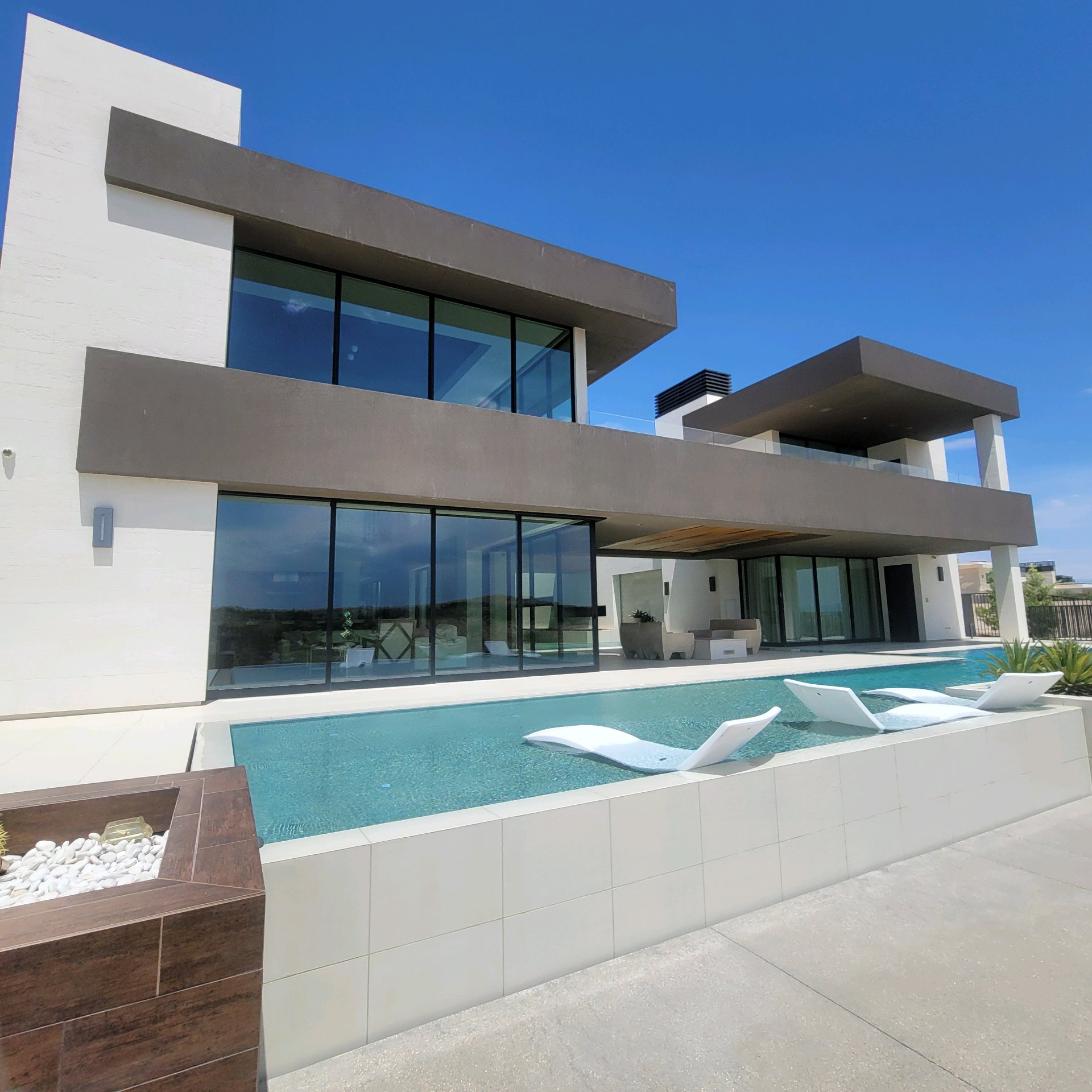 Ultra-luxury modern home after solar window tinting Las Vegas NV infinity pool
