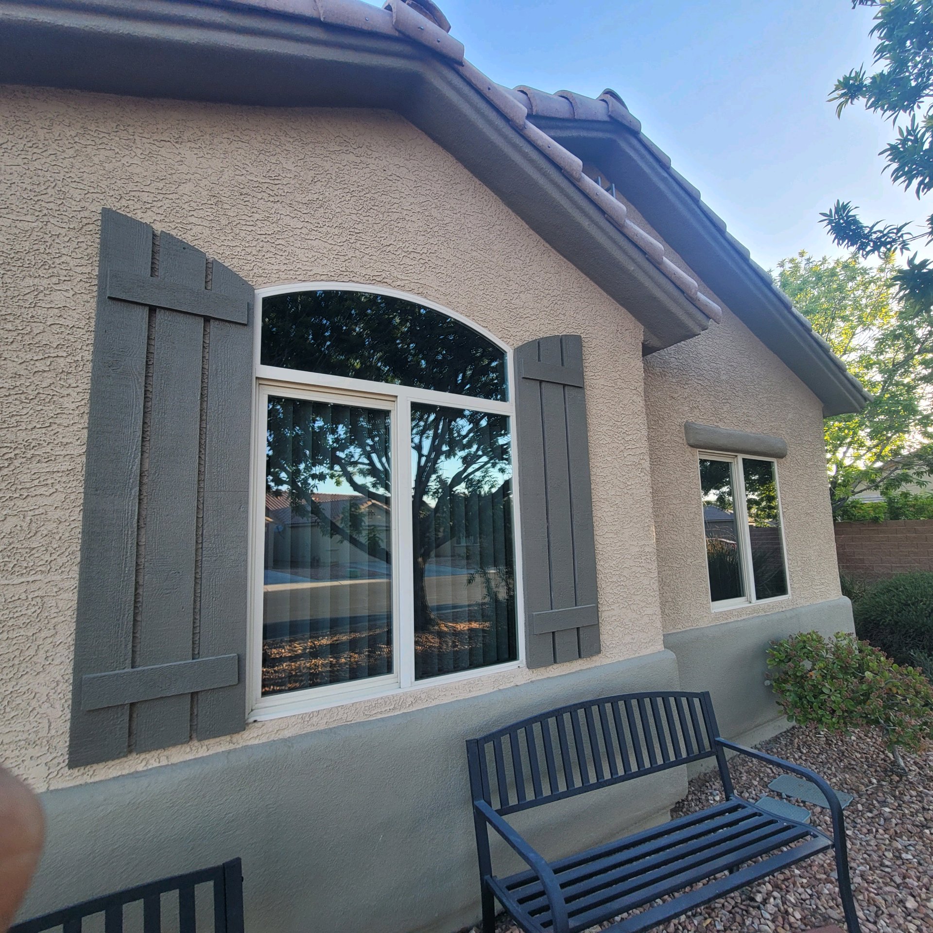 Home front windows after solar film installation